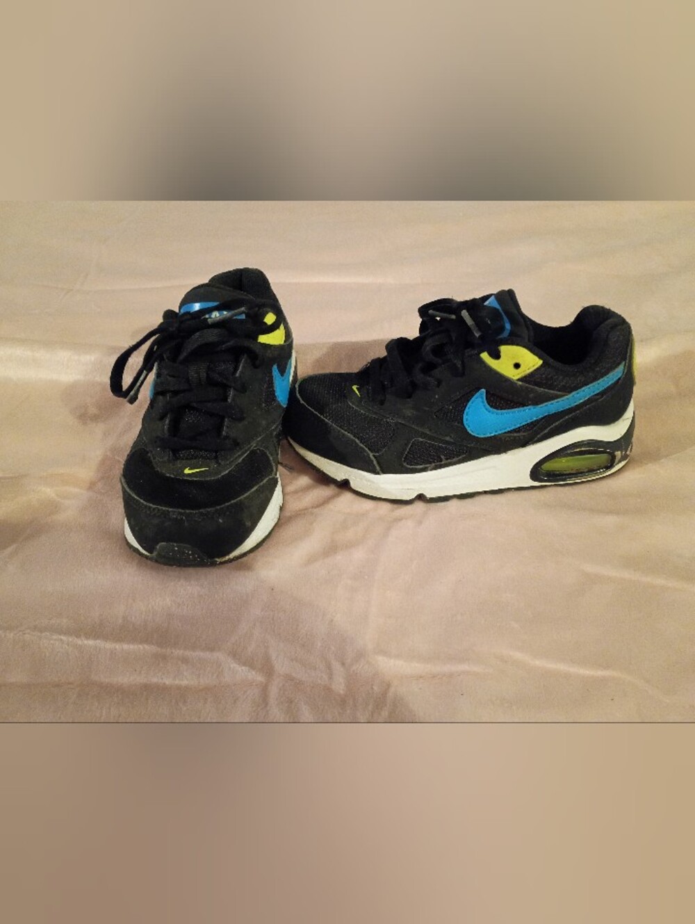 Nike Kids Black Sneakers with Blue Swoosh and Yellow Accents